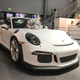 Illustration for article titled This Couple Topped Your Wildest Dreams By Getting Married In A Porsche Showroom